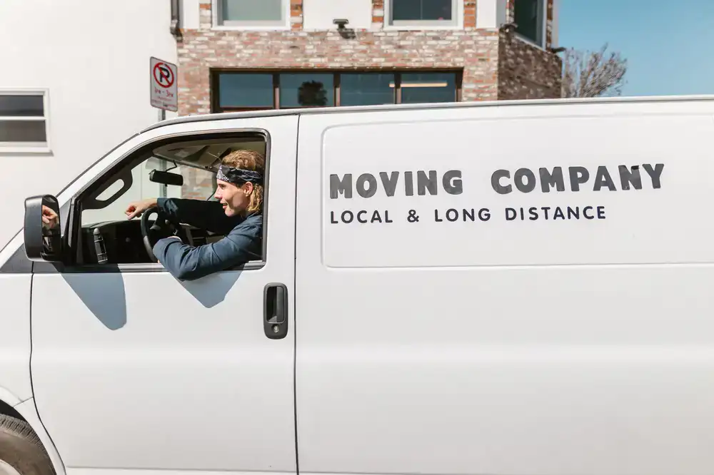 Crisp & Clean delivery van parked on a residential street for garment collection